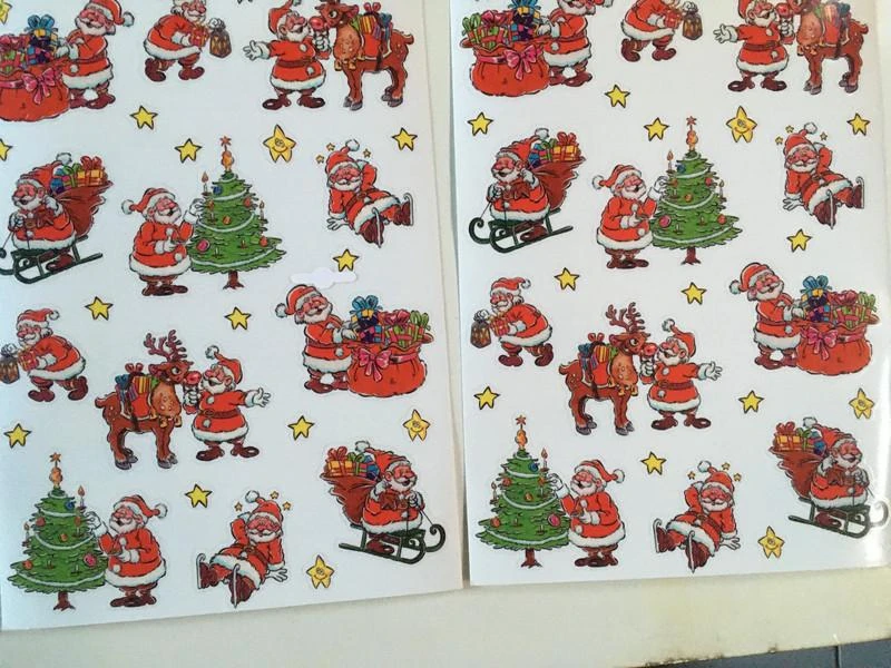 2 feuilles identiques 30 cm x 21 cm de stickers / autocollants père noel - neuf